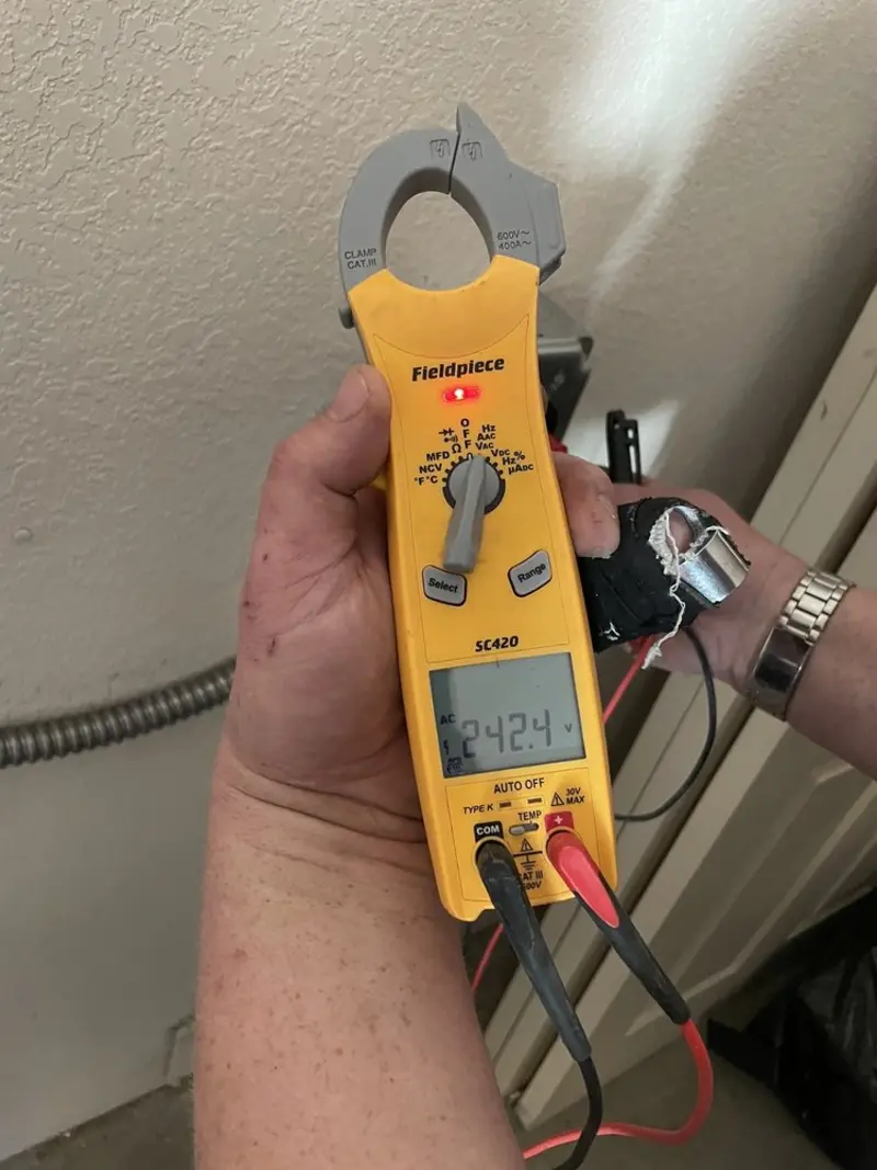 Voltage testing with clamp meter during Hot Tub / Pool Electrical Wiring in University Park
